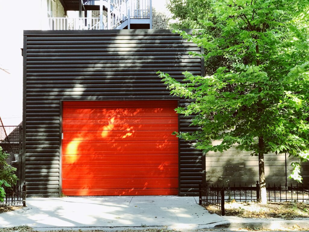 Red closed door shutter of a garage