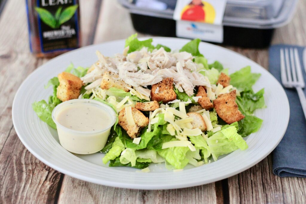 Chicken vegetable salad in a white plate