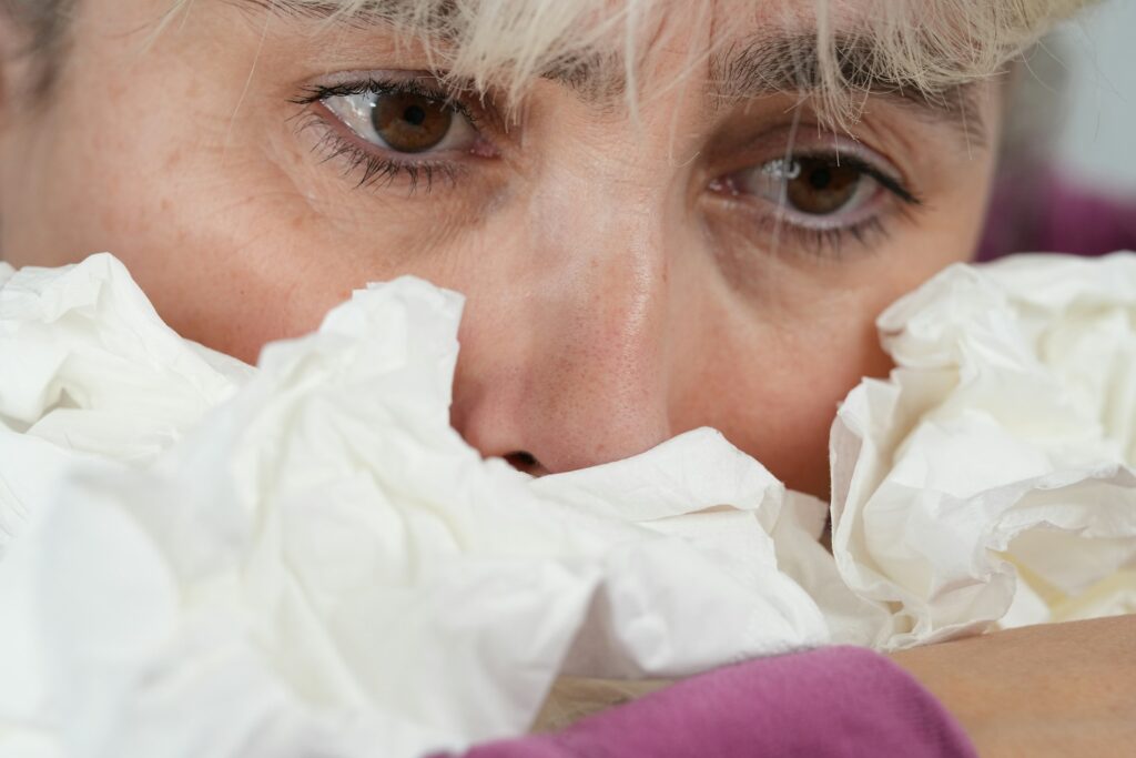Close up of a face covered with water wipes
