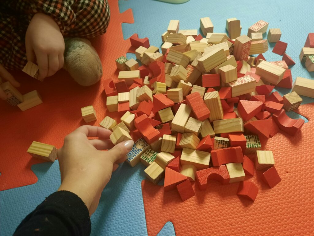 Kids playing with puzzle pieces