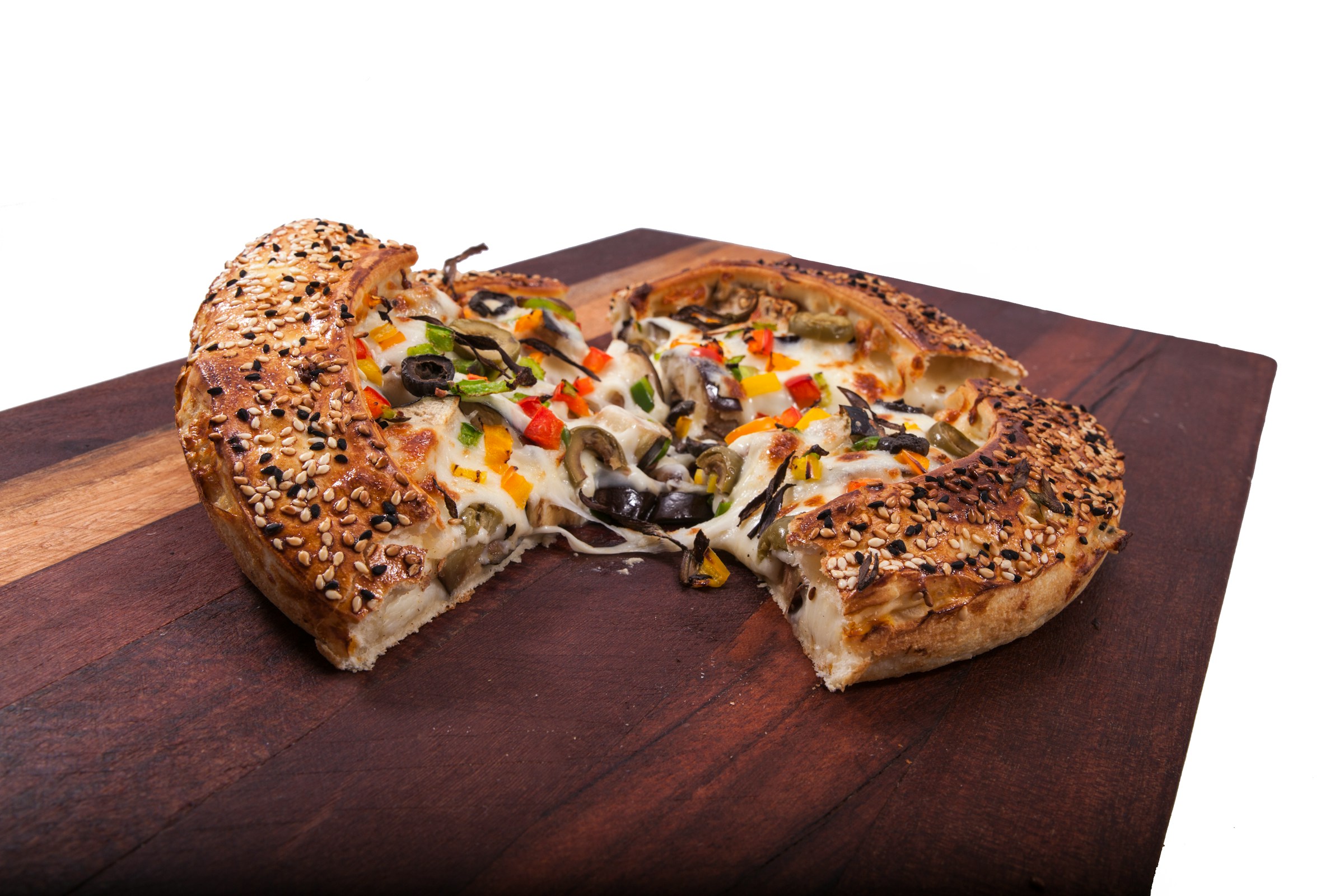 A piece of pizza on a table
