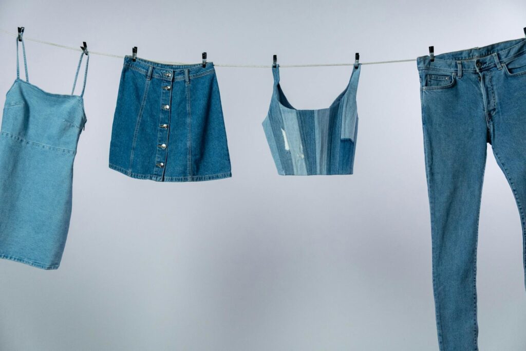 Denim dress clothes hanging on a clothesline — casual and stylish fashion inspiration for everyday wear.