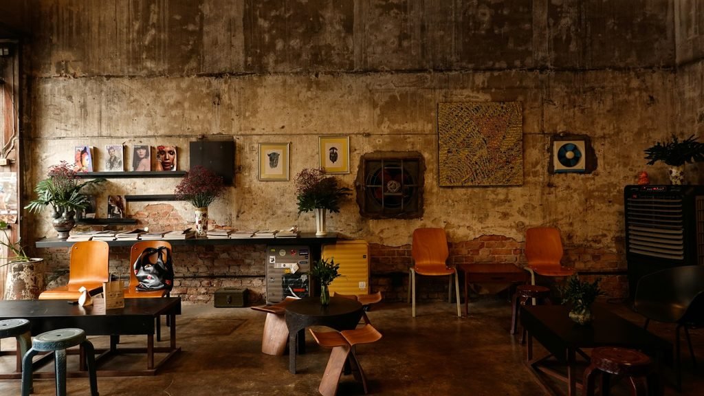 industrial style room with exposed brick and concrete walls